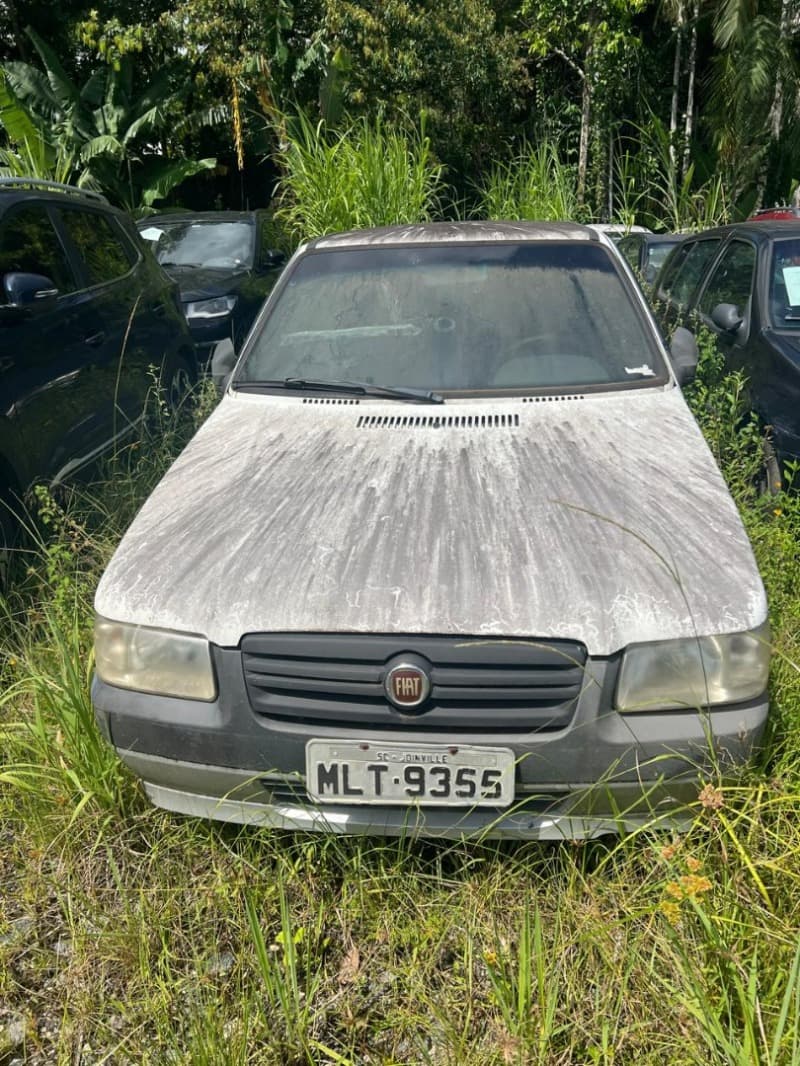 Veículo FIAT/Uno Mille Economy, ano modelo 2013, alcool-gasolina, PLACAS MLT9355 - leilão judicial - Joinville / SC SC - lance mínimo R$ 10.695